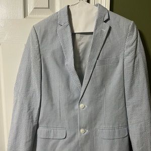 Blue and white pin stripe suit